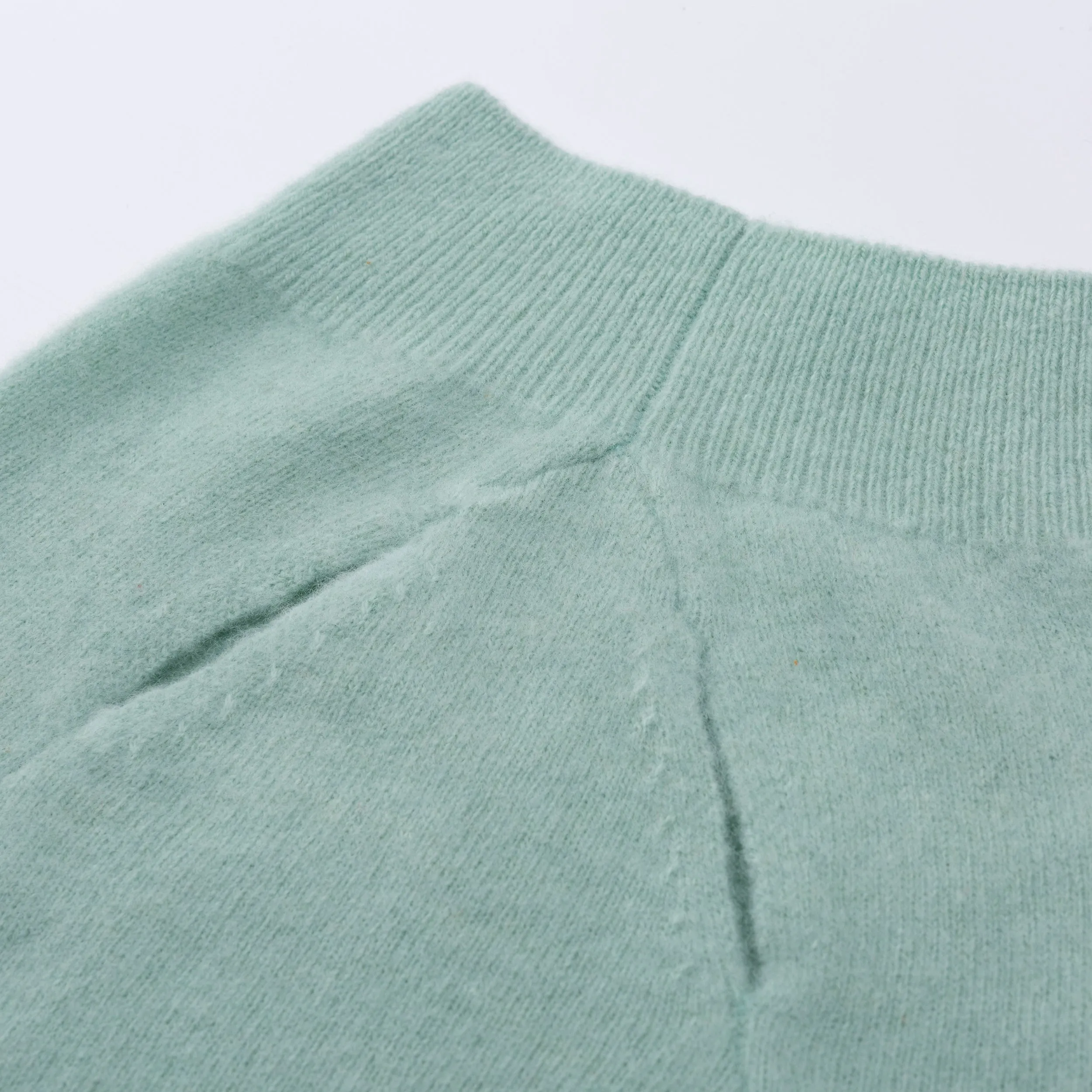Sleeveless Jumper with Golden Metal Logo