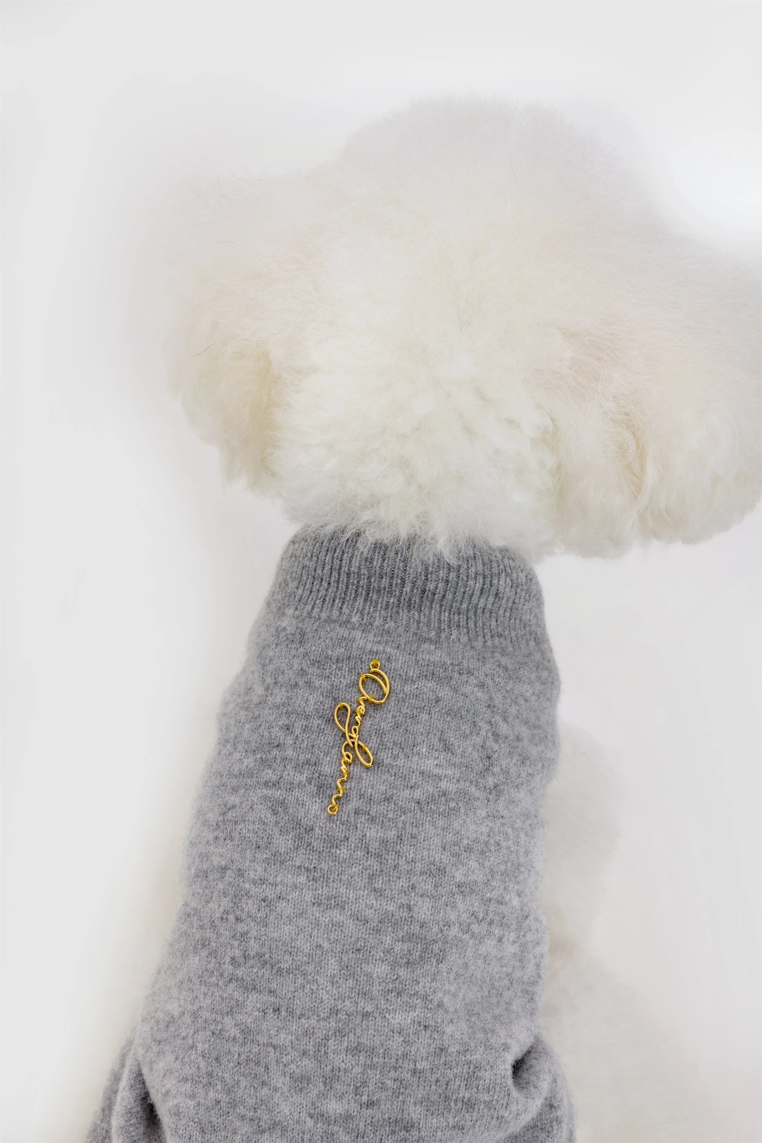 Sleeveless Jumper with Golden Metal Logo